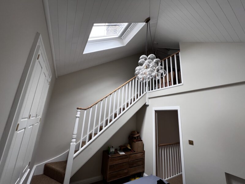 Staircase and landing lit by a rooflight in a renovated Victorian house