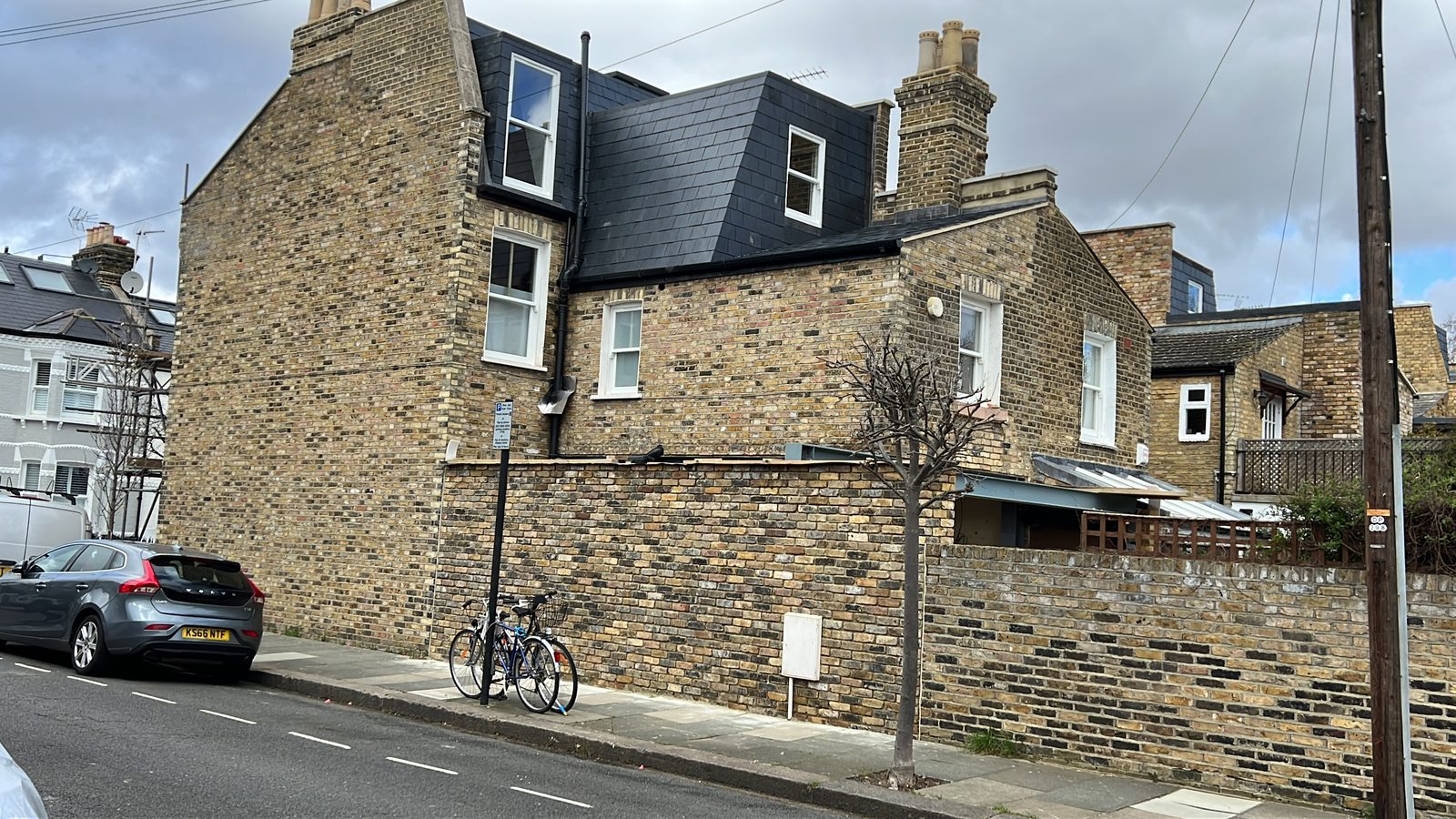 Completed slate-clad dormer and new windows at Campana Road, Fulham
