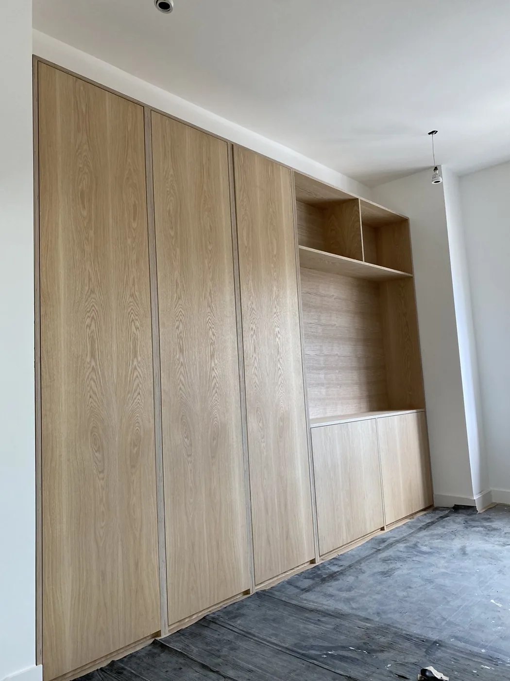 Full-height oak-veneer fitted wardrobe with open shelving