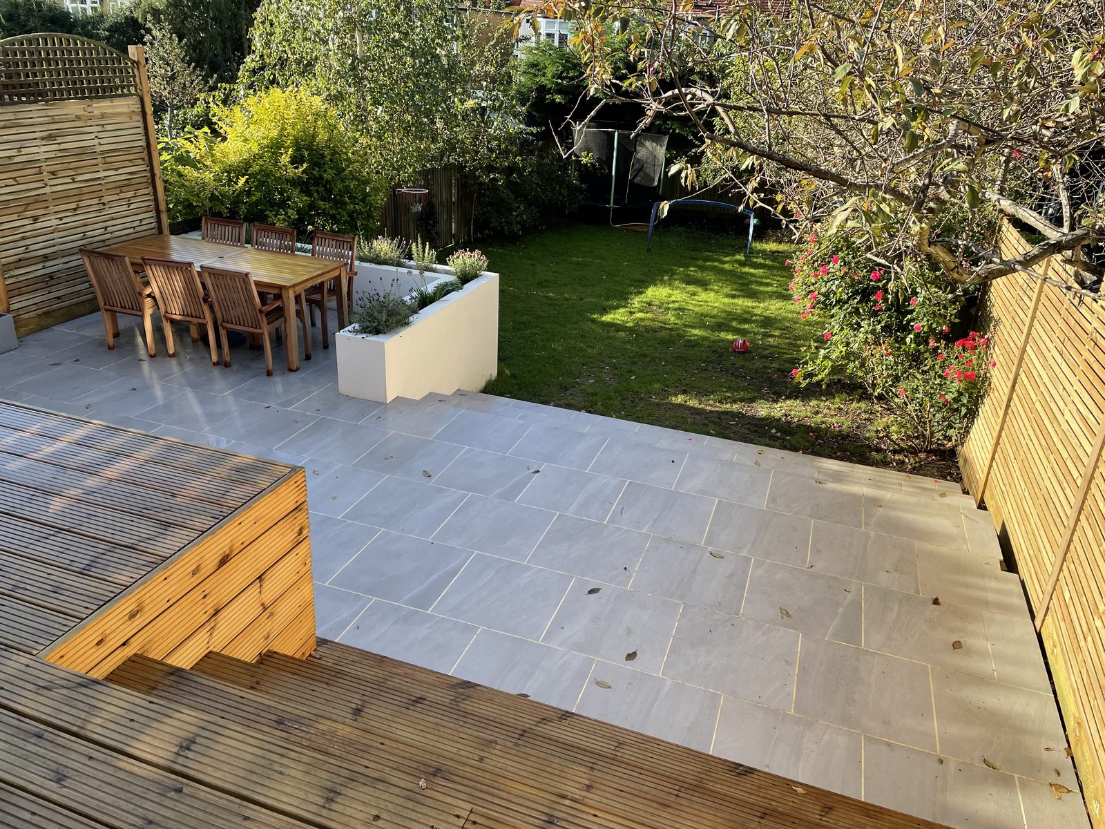 Terraced garden with new steps and paved outdoor areas on Park Way, Wimbledon